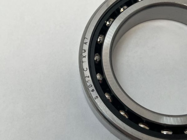 Angular contact bearings – 65 mm ID, 100 mm OD, 18 mm Width, Open, 15°, Light preload.