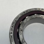 Angular contact bearing – 70 mm ID, 125 mm OD, 24 mm Width, Open, 25°.