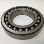 SRO 1214 double row self-aligning ball bearing, 70mm ID x 125mm OD x 24mm Width, with stamped steel cage. Accommodates angular misalignment, 5300 rpm limit, ideal for simple mounting in industrial machines globally.