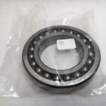 SRO 1214 double row self-aligning ball bearing, 70mm ID x 125mm OD x 24mm Width, with stamped steel cage. Accommodates angular misalignment, 5300 rpm limit, ideal for simple mounting in industrial machines globally.