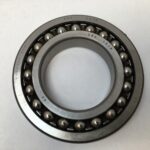 SRO 1214 double row self-aligning ball bearing, 70mm ID x 125mm OD x 24mm Width, with stamped steel cage. Accommodates angular misalignment, 5300 rpm limit, ideal for simple mounting in industrial machines globally.