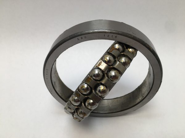 SRO 1214 double row self-aligning ball bearing, 70mm ID x 125mm OD x 24mm Width, with stamped steel cage. Accommodates angular misalignment, 5300 rpm limit, ideal for simple mounting in industrial machines globally.