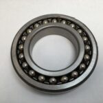 SRO 1214 double row self-aligning ball bearing, 70mm ID x 125mm OD x 24mm Width, with stamped steel cage. Accommodates angular misalignment, 5300 rpm limit, ideal for simple mounting in industrial machines globally.