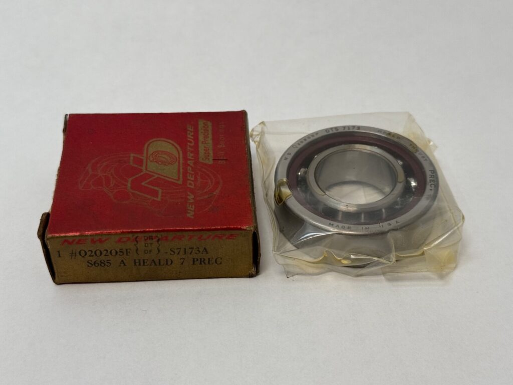 NDH Q20205F Angular Contact Ball Bearing (25mm ID, 52mm OD, 15mm Width). Heritage “Q” series designed for precise axial and radial load handling in US machinery.