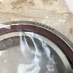 Angular contact bearing – 65 mm ID, 100 mm OD, 18 mm Width, Open, 15° Contact Angle, Light Preload.