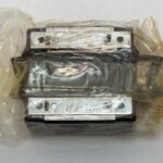 THK SR20V1UU Linear Motion Rolling Guide Block. Compact heavy load capacity LM block with 20mm rail width and 26mm width. Uses 4 rows of steel balls for smooth, low-friction movement in high-precision machinery.