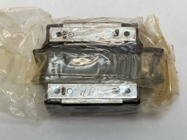THK SR20V1UU Linear Motion Rolling Guide Block. Compact heavy load capacity LM block with 20mm rail width and 26mm width. Uses 4 rows of steel balls for smooth, low-friction movement in high-precision machinery.