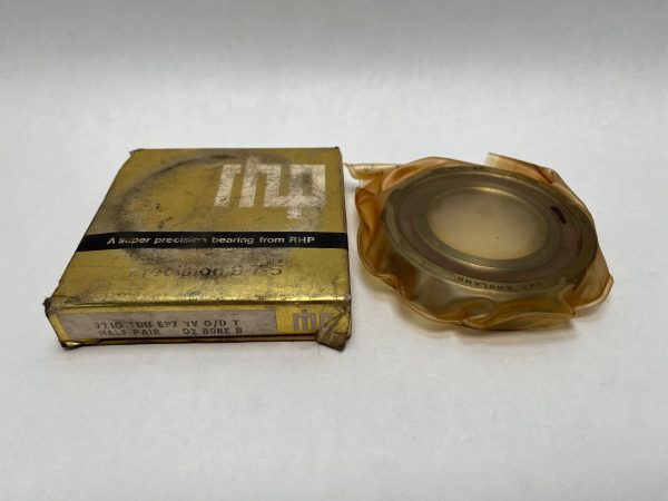 RHP 7210TDULP4 angular contact bearing in protective wrapping beside its original RHP packaging box