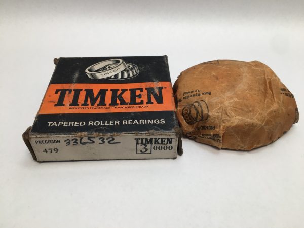 Timken 479 tapered roller bearing cone in original box next to its wrapped paper packaging