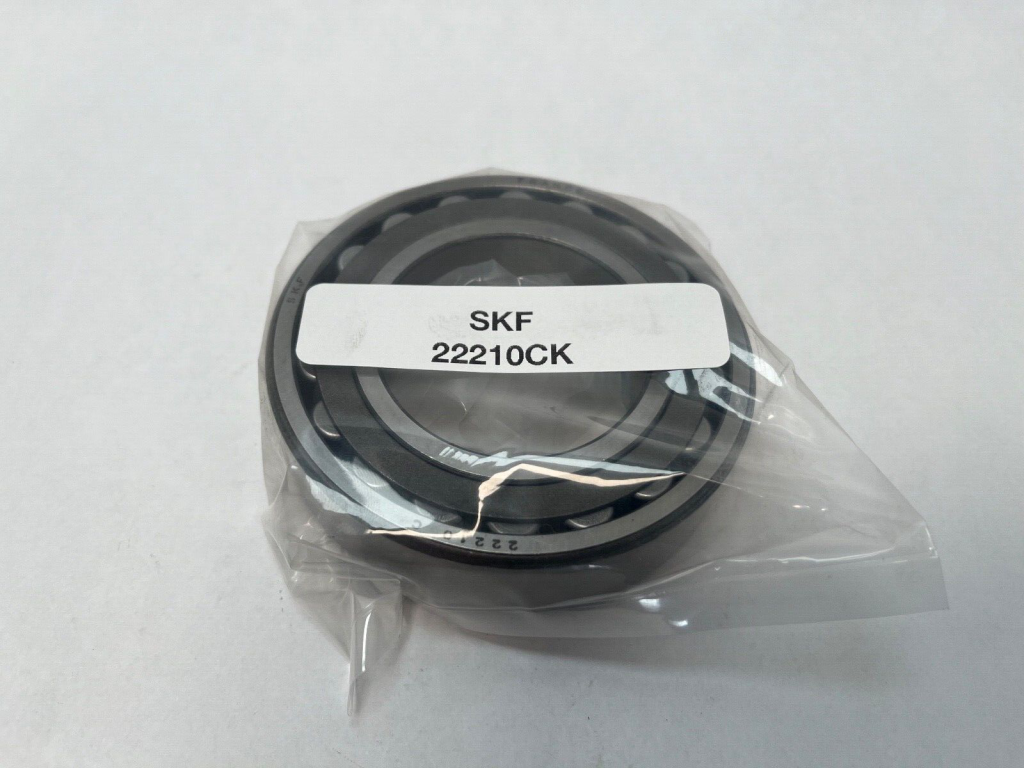 SKF 22210-CK Spherical Roller Bearing. 50mm ID (Tapered) 90mm OD 23mm Width. Tapered bore (K) requires adapter sleeve H310. Self-aligning design.