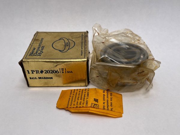 NDH 20206DTX5A angular contact ball bearing in its original box, unwrapped in protective plastic beside it