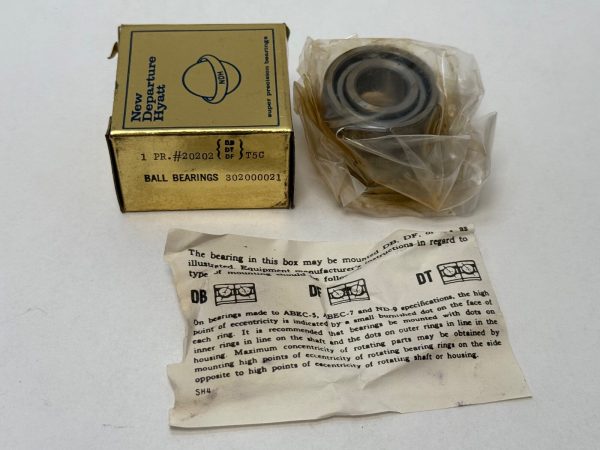 NDH 20202DTT5C bearing pair in gold box with plastic-wrapped bearings and mounting instructions sheet