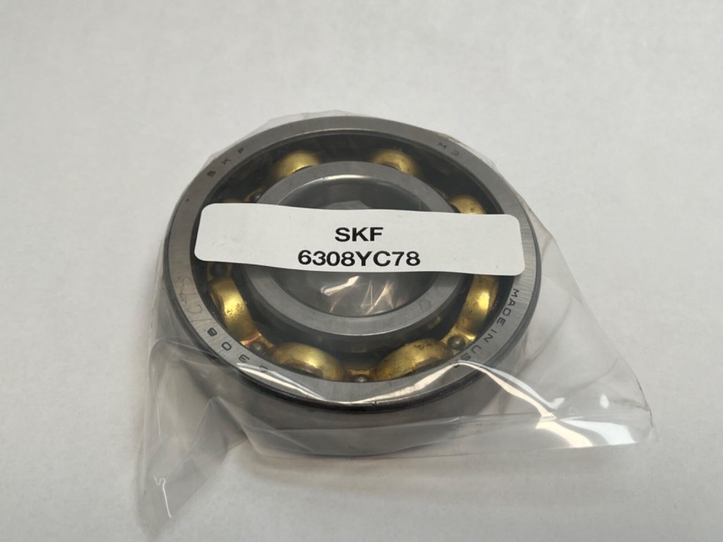 SKF 6308YC78 Deep Groove Ball Bearing (40mm ID, 90mm OD, 23mm Width). Special "Y" brass cage design for enhanced durability in demanding US motor applications.
