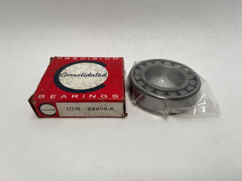 Steyr (SKF) 22209CK Spherical Roller Bearing (45mm ID, 85mm OD, 23mm Width). Tapered bore for easy mounting on adapter sleeves in US mining and aggregate equipment.