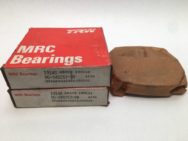 Two stacked MRC Bearings 1914S ABEC3 boxes beside a paper-wrapped bearing