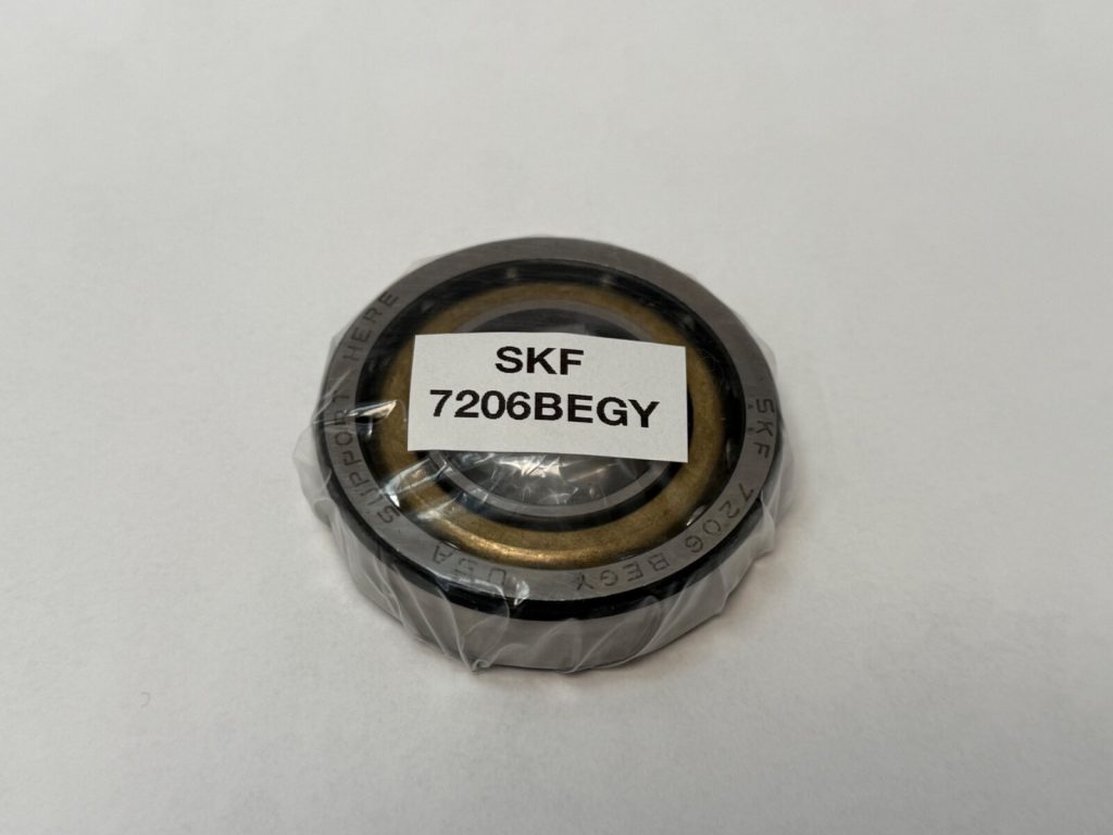 High-speed single row angular contact ball bearing, 30mm ID x 62mm OD x 16mm Width, with 40° contact angle. Features a non-metallic cage and P6 precision for demanding applications globally.