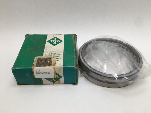 INA NK95/26NKI needle roller bearing in plastic wrap next to its green INA box