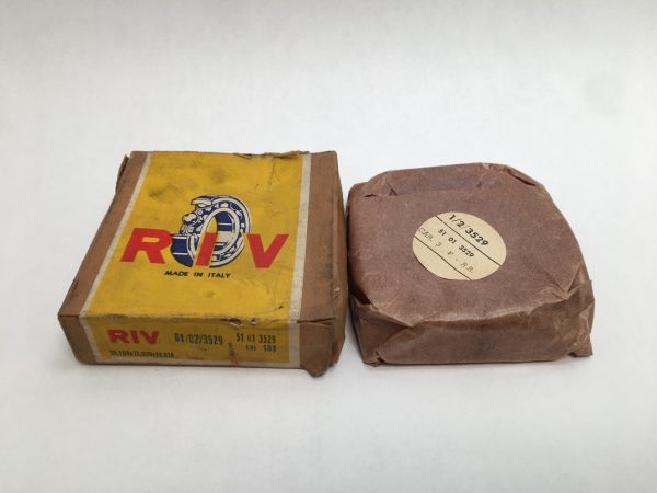 Timken 3529 tapered roller cup in original RIV box next to a wax-paper wrapped unit