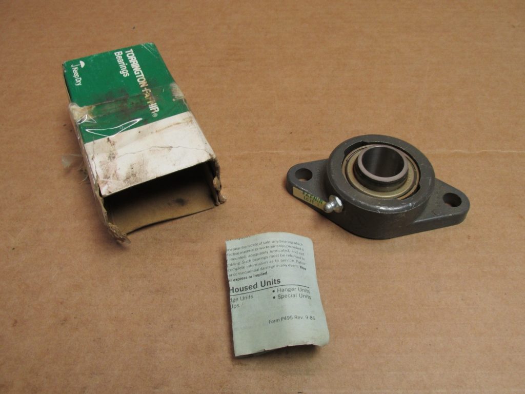 Torrington LCJT1 2-Bolt Flange Bearing Unit. 1.000 in Bore. Cast iron housing. Eccentric locking collar. Standard industrial duty.