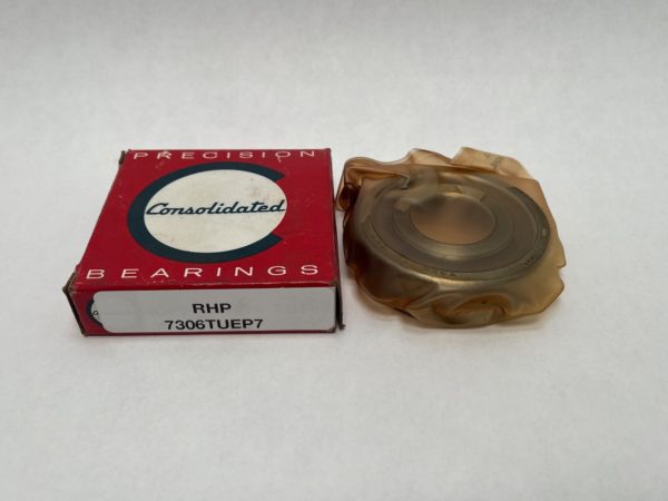RHP 7306TUEP7 angular contact bearing wrapped in plastic beside its Consolidated Bearings box