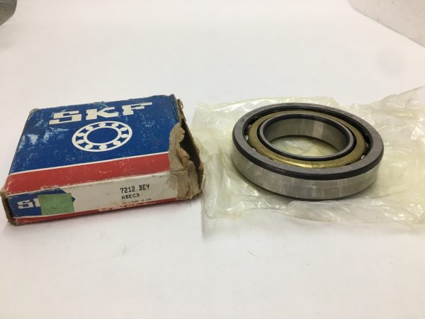 SKF 7212BEY angular contact ball bearing next to its original SKF box