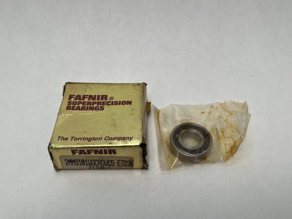 Fafnir 2MM9101WO-SUL angular contact ball bearing next to its Torrington gold Fafnir Superprecision Bearings box