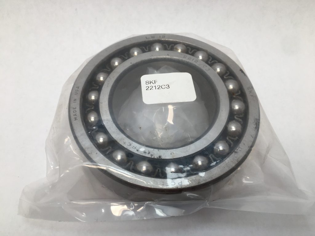 SKF 2212C3 Self-Aligning Ball Bearing (60mm ID, 110mm OD, 28mm Width). C3 clearance handles thermal expansion in high-speed US industrial fans.