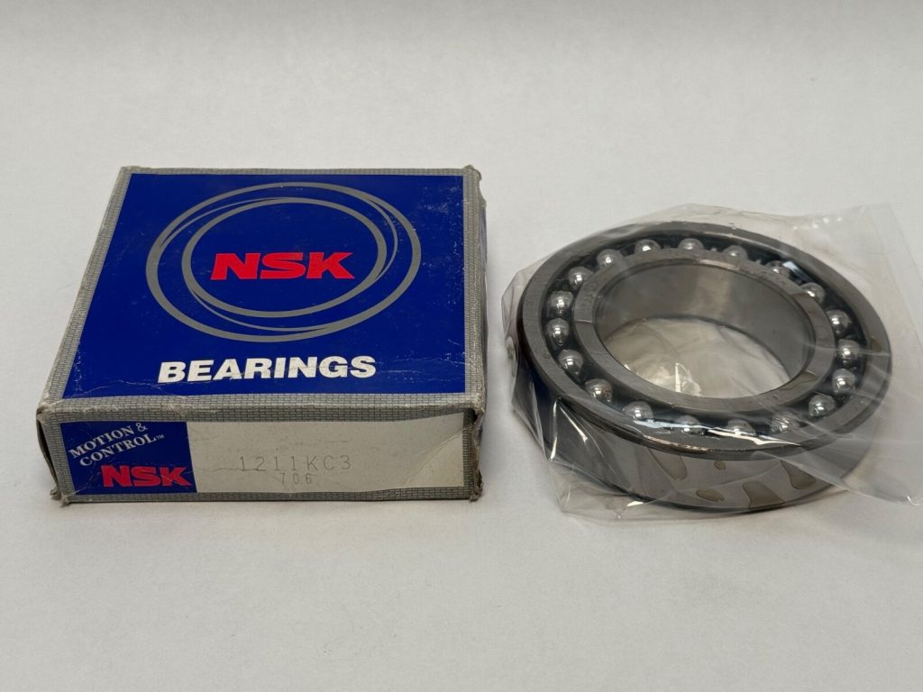 NSK 1211KC3 Self-Aligning Ball Bearing. 55mm ID (Tapered) 100mm OD 21mm Width. Tapered bore (K) for use with adapter sleeve. C3 internal clearance.