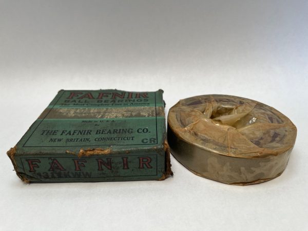 Fafnir MM311K ball bearing wrapped in protective paper beside its original green Fafnir Bearing Co. box