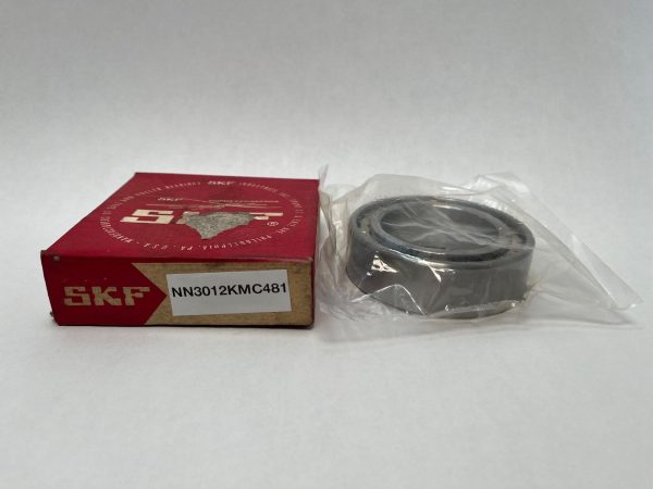 SKF NN-3012-KMC/C481 cylindrical roller bearing in plastic wrap next to its red SKF box