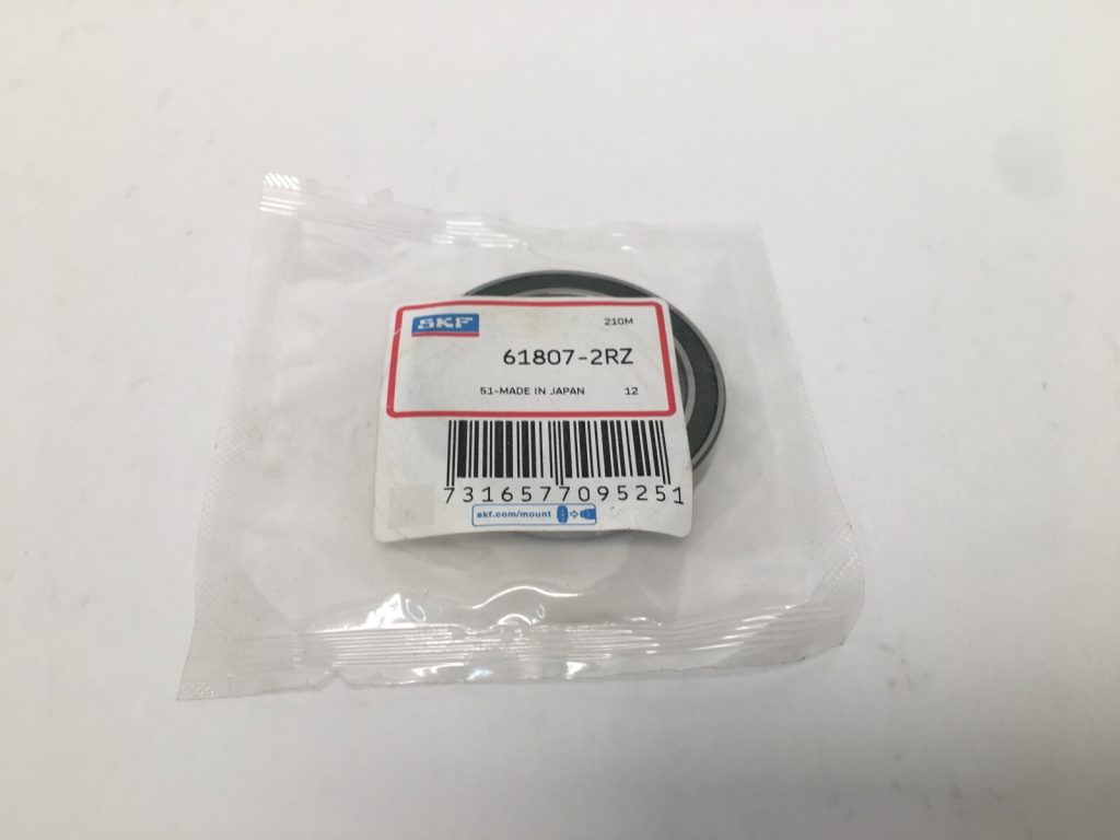 SKF 61807-2RZ thin section deep groove ball bearing, 35mm ID x 47mm OD x 7mm Width, with double metal shields. Features normal clearance and a limiting speed of 15000 rpm for small machinery in the USA.