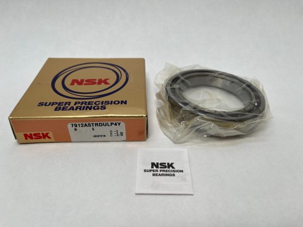 NSK 7912A5TRDULP4Y angular contact ball bearing, shown in plastic wrap beside its gold NSK Super Precision Bearings box