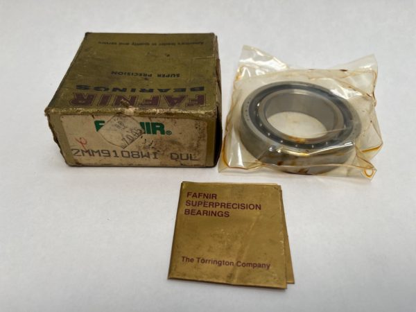 Fafnir 2MM9108WIDUL angular contact ball bearing in plastic wrap beside its original labeled box