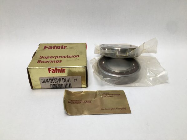 Fafnir angular contact bearings stacked on top of their yellow superprecision box