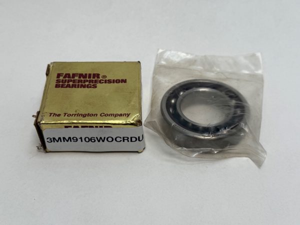 Fafnir 3MM9106WOCRDUL angular contact ball bearing in plastic wrap next to its gold Fafnir Superprecision Bearings box