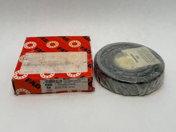 FAG NU310-E-TVP2 cylindrical roller bearing next to its red FAG packaging box