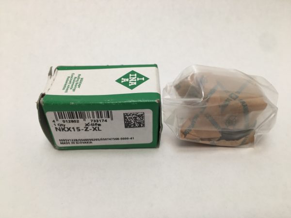 INA NKX15-Z-XL combo needle roller bearing next to its green and white labeled box