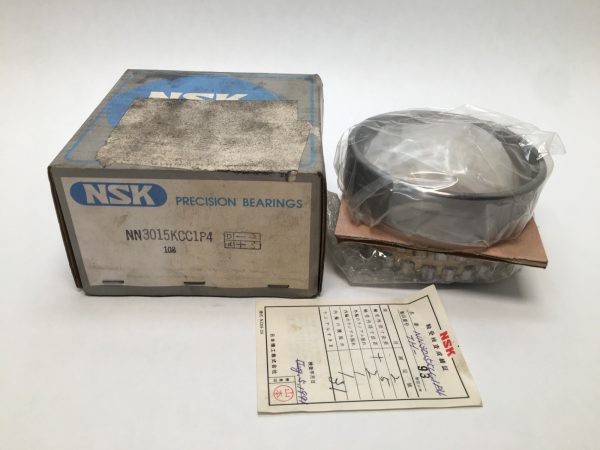 NSK NN3015KCC1P4 cylindrical roller bearing in plastic wrap beside its original NSK box and inspection slip
