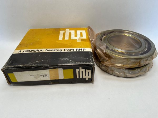 RHP 7221CTDUM angular contact bearing wrapped in plastic beside its original RHP box
