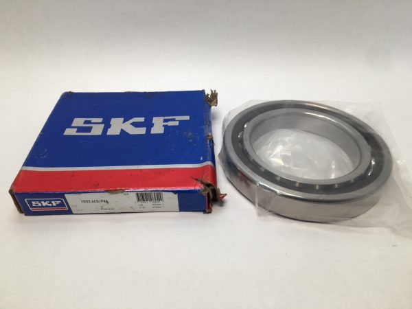 SKF 7022ACD/P4A angular contact ball bearing in plastic wrap next to its SKF box