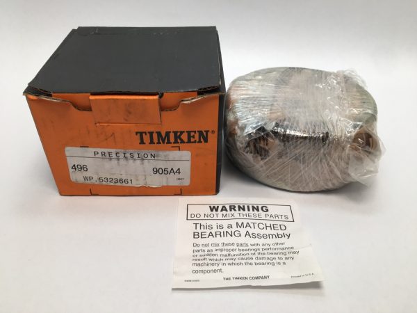 Timken 496-905A4 bearing set wrapped in plastic beside its orange Timken box and matched-assembly warning tag