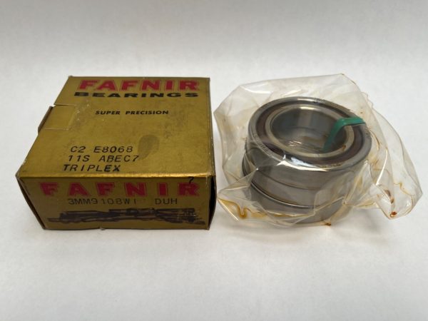 Fafnir 3MM9108WIDUH angular contact ball bearing, oil-coated, beside its original Fafnir packaging box