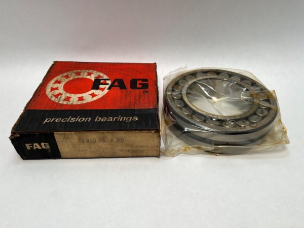 FAG 22218ASKMW33 spherical roller bearing shown in plastic wrap next to its original FAG box