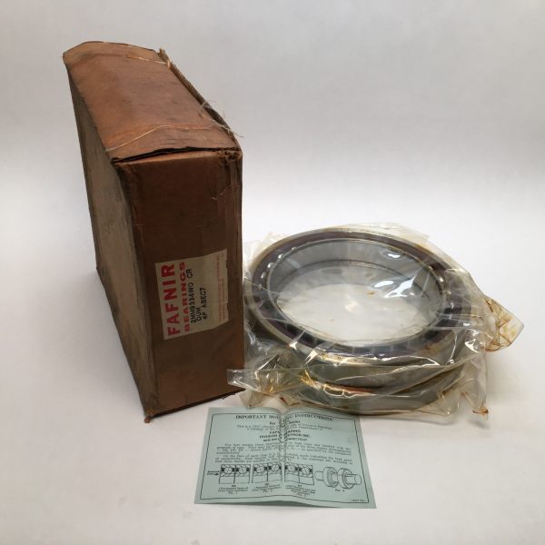 Fafnir bearing cardboard box next to plastic-wrapped angular contact bearing with instruction sheet
