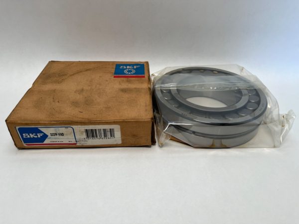 SKF 22219VADW33 spherical roller bearing, shrink-wrapped, next to its original SKF cardboard box
