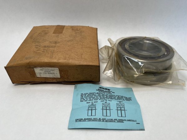 NHBB ME2211DH angular contact ball bearing in plastic wrap beside its cardboard box and instruction sheet