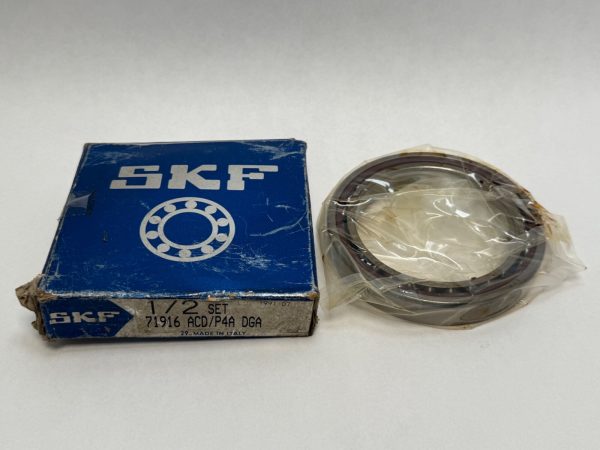 SKF 71916ACD/P4A DGA angular contact ball bearing, shrink-wrapped, beside its original SKF box
