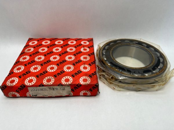 FAG 22218ESTVPBC3 spherical roller bearing shown next to its red FAG packaging box