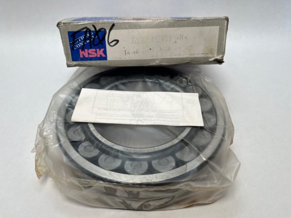 NSK 22222EAKE4C3 spherical roller bearing in plastic wrap, shown with its original NSK box