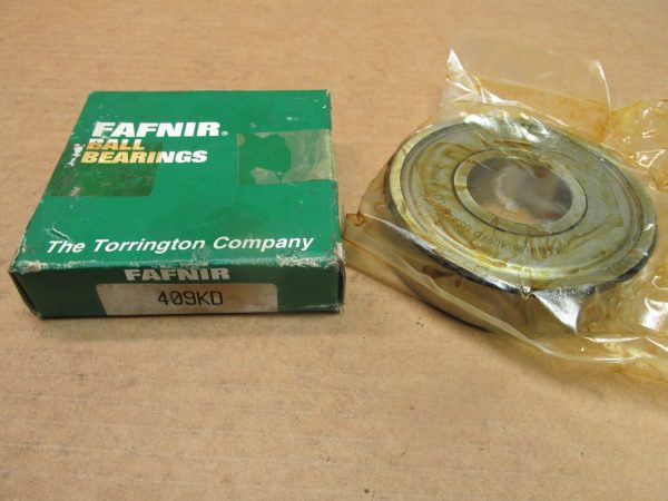 Fafnir 409KD deep groove ball bearing in plastic wrap next to its green Fafnir box